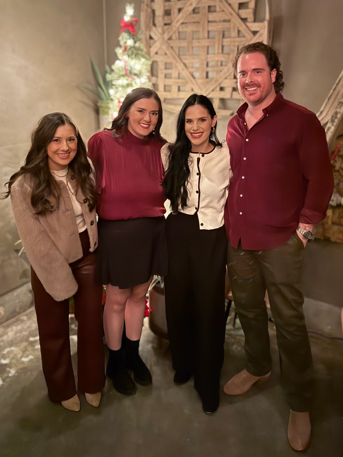 A group of medical team members posing at a holiday party